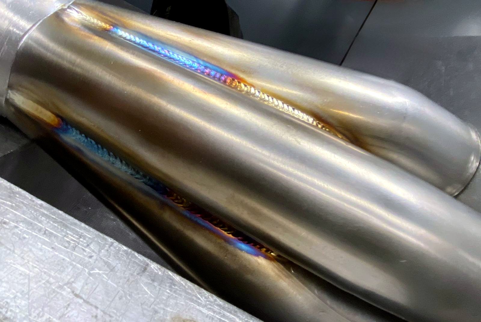 Three-into-one exhaust merge collector with heat-tinted TIG welds